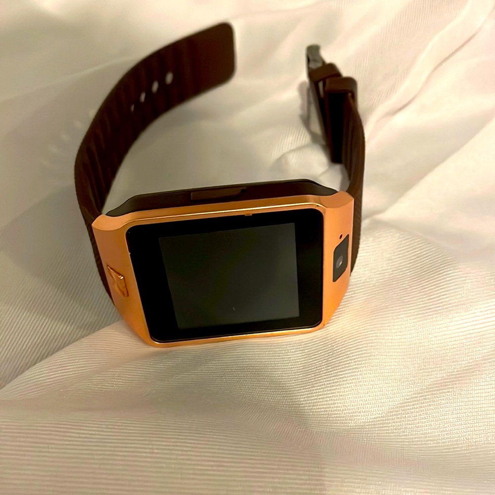 Watch never used don’t have the box works with old android charger